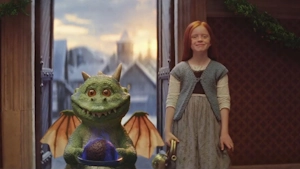 Image from the 2019 John Lewis holiday advert, featuring Excitable Edgar, a CGI dragon with a lit Christmas pudding.