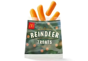 A package of McDonald's UK Reindeer Treats, carrot sticks in a holiday bag.