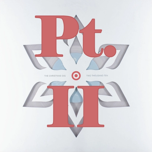 Cover of the Target's The Christmas Gig: Two Thousand Ten, featuring a cut out snowflake, showing the clear vinyl record through the cover, with the words 'Pt. II' over the image.